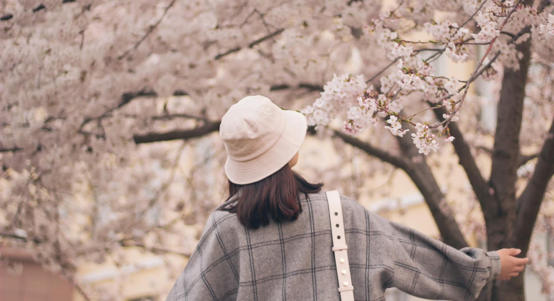 photo of girl wearing bucket hat