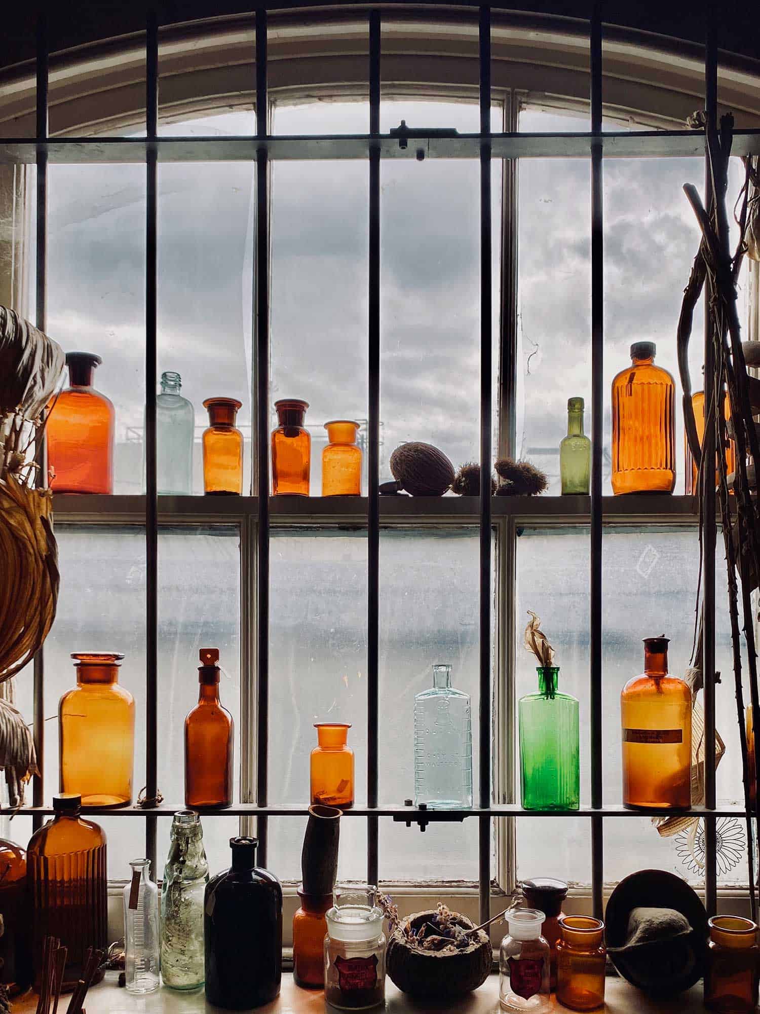 vintage bottles in window