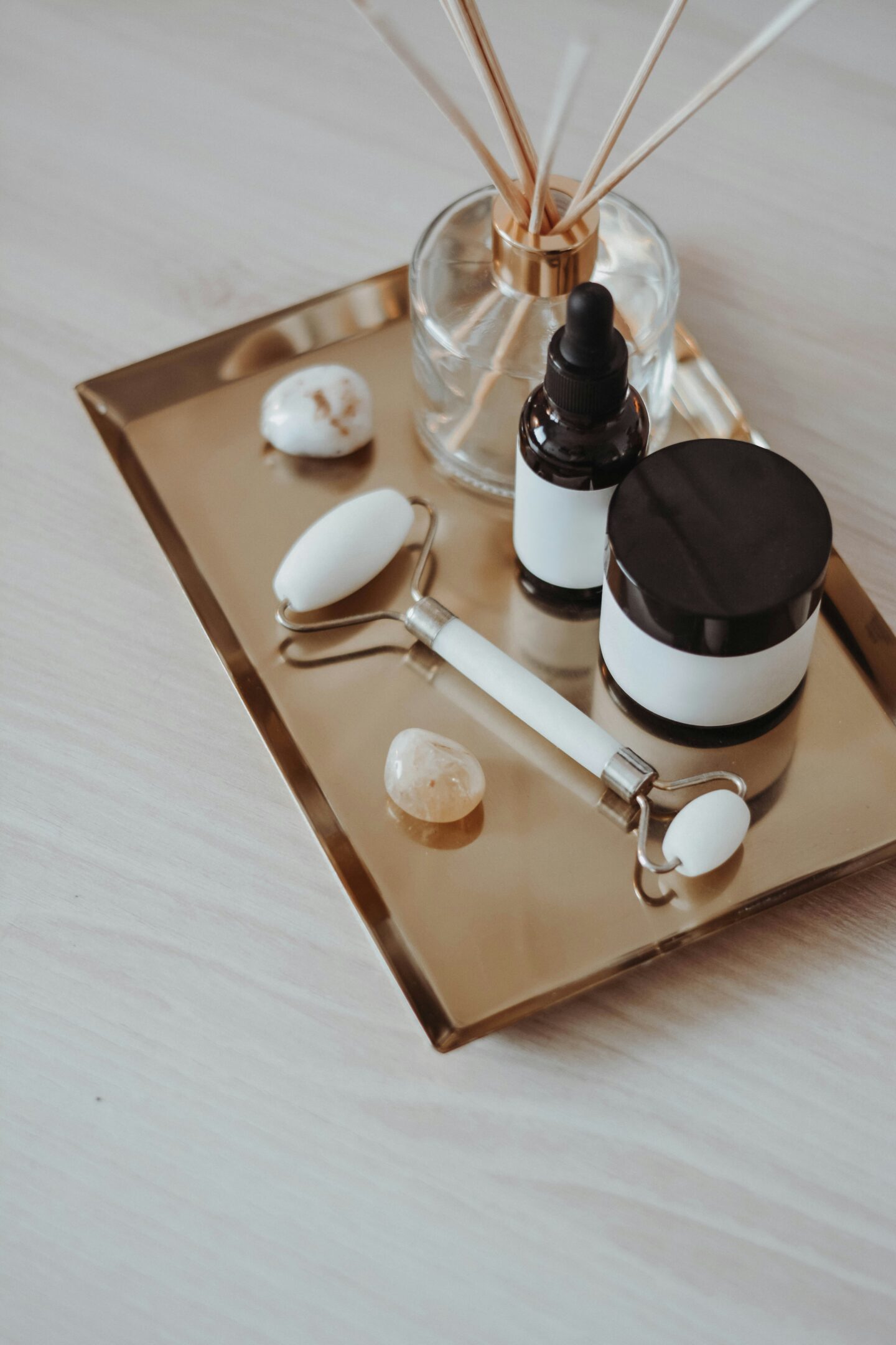 collection of wellness items and skincare on a tray.