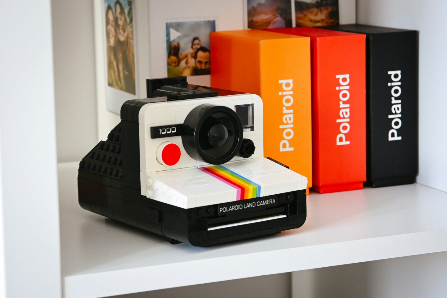 polaroid camera on shelf