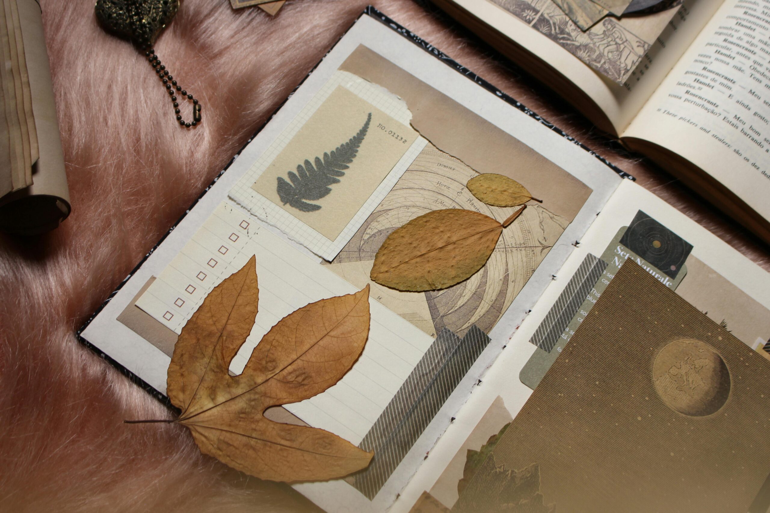 junk journal with dried leaves.
