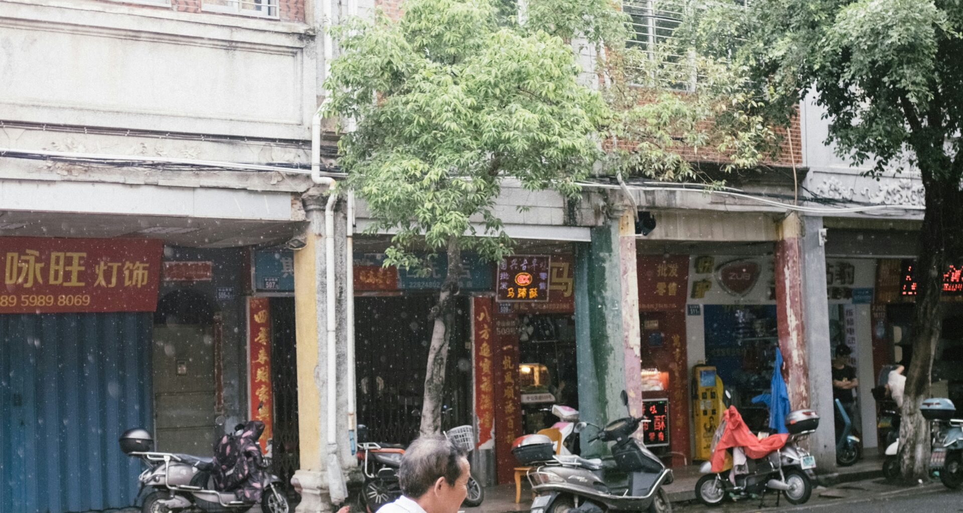 man riding mobility scooter