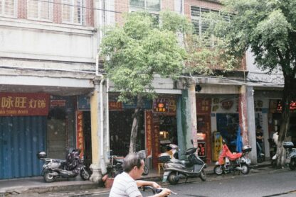 man riding mobility scooter