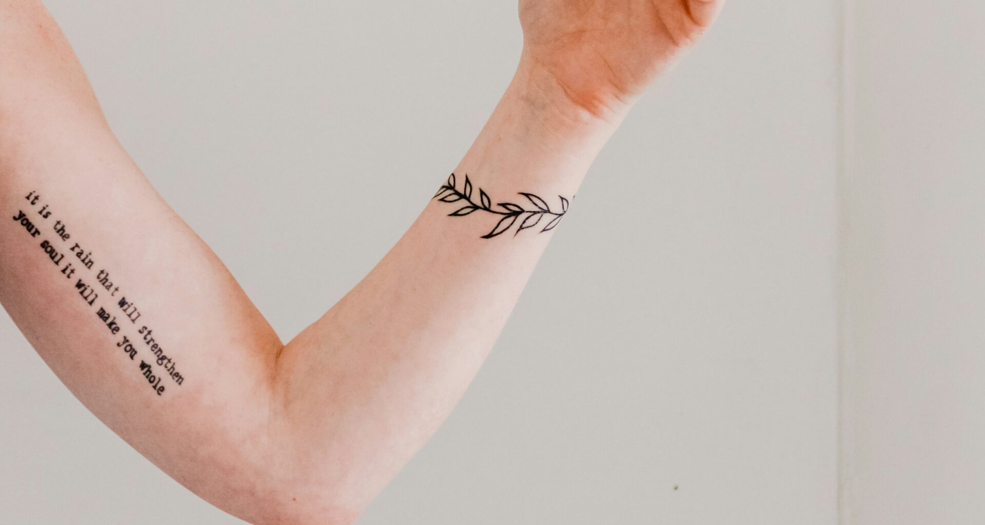 feminine tattoos on arm