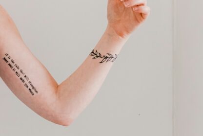 feminine tattoos on arm