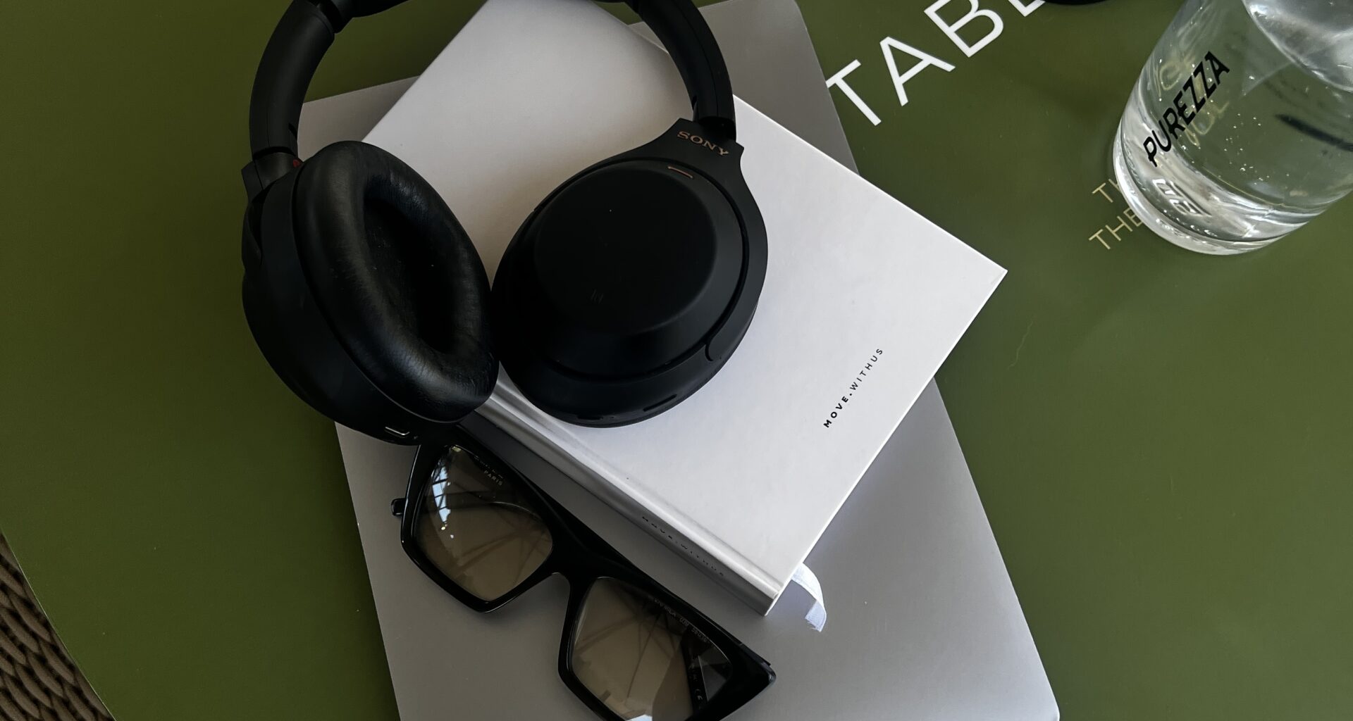 tech flatlay headphones laptop