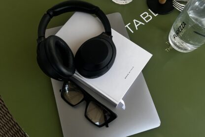 tech flatlay headphones laptop