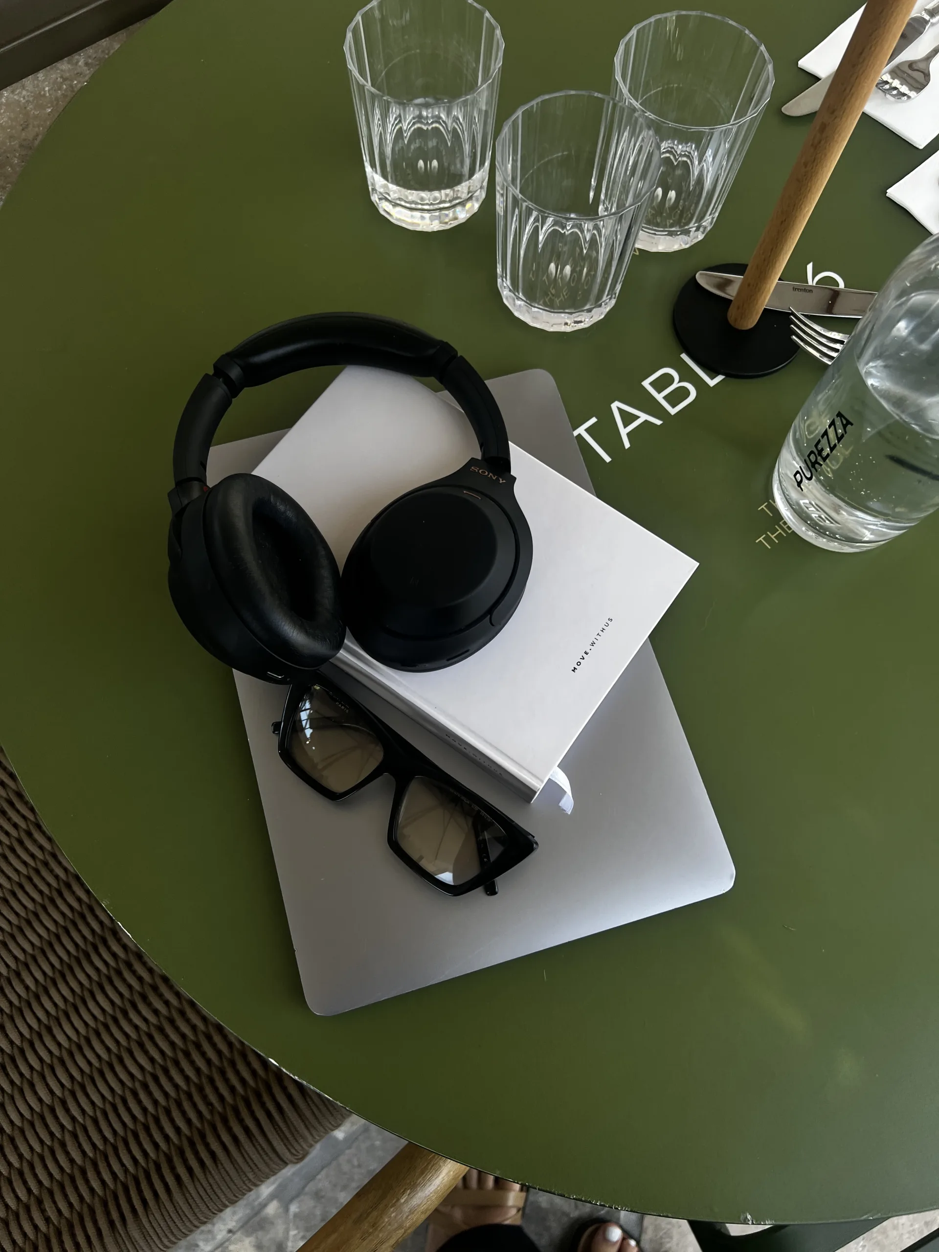 tech flatlay headphones laptop