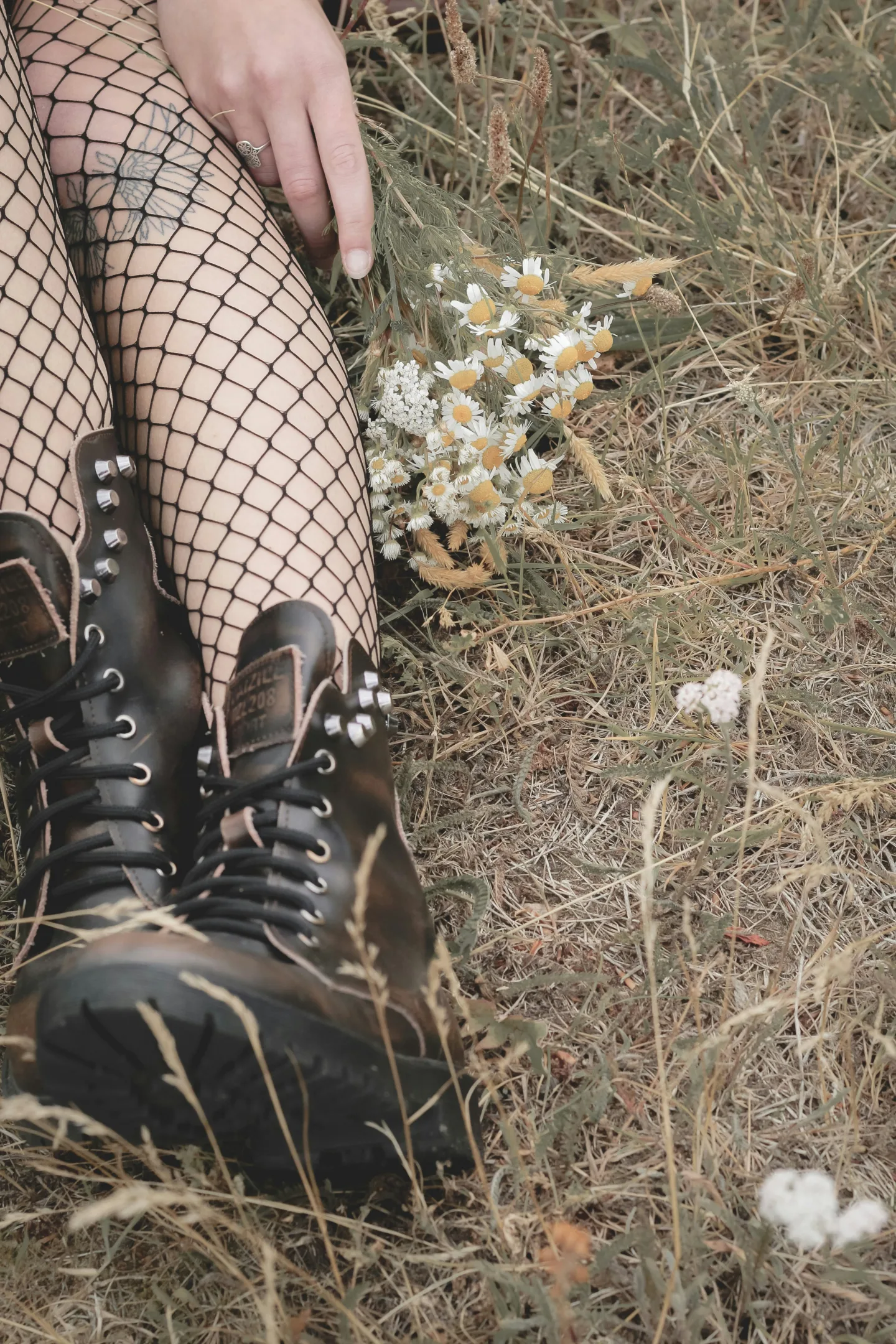 grunge leather boots with fishnet tights