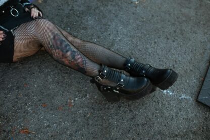 grunge fashion boots and fishnet tights
