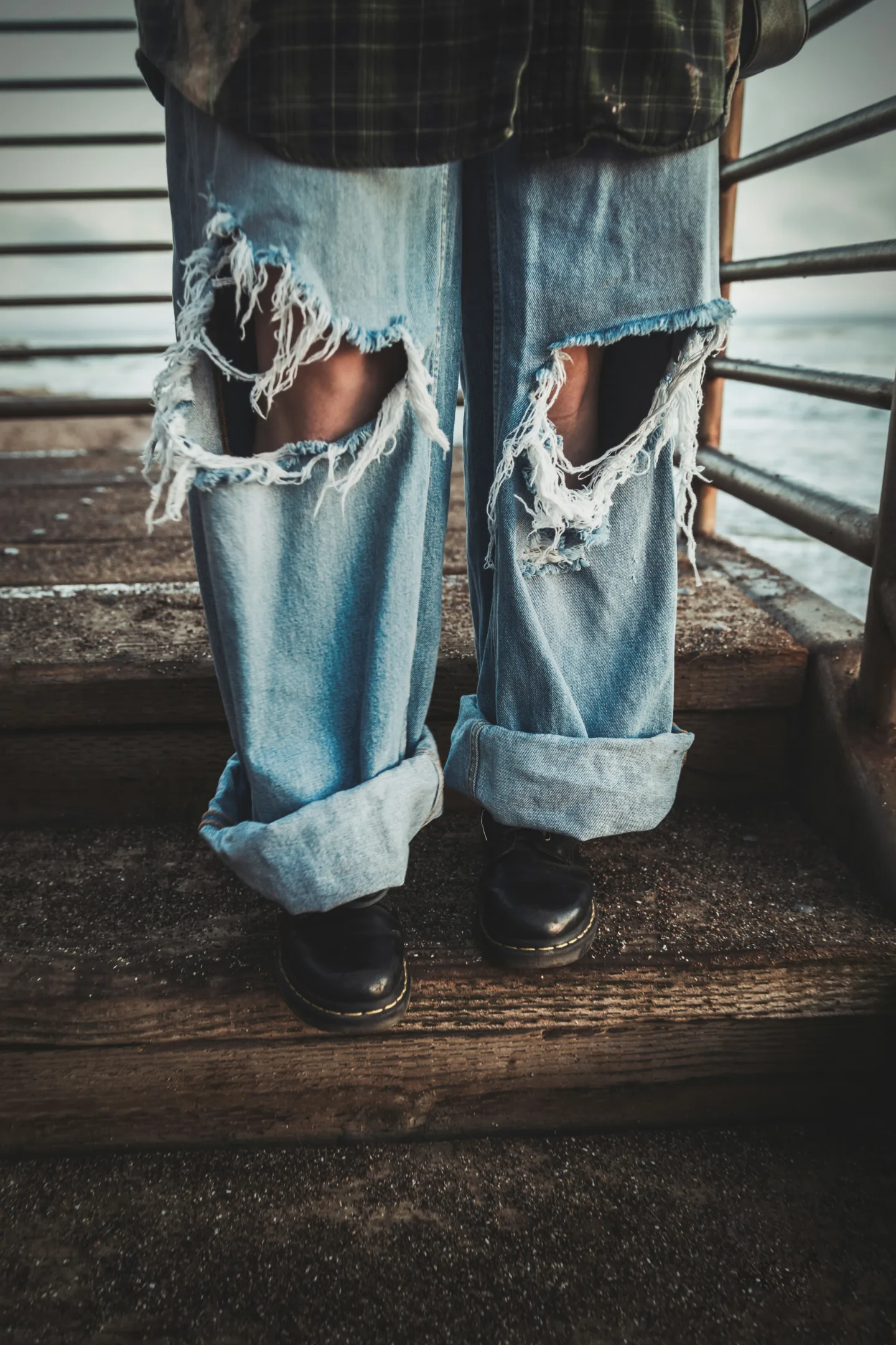 grunge style distressed denim jeans
