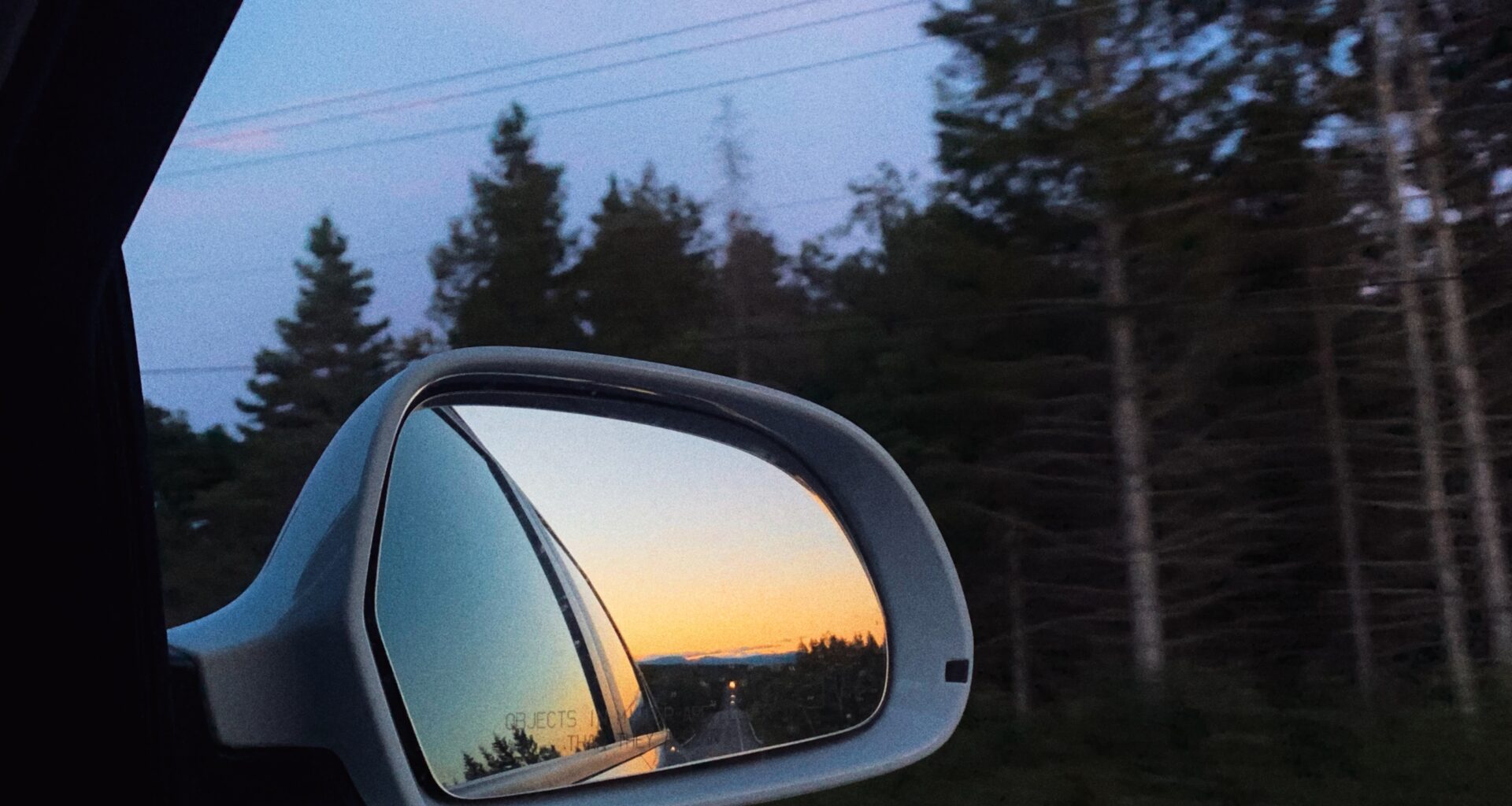 looking out of car window
