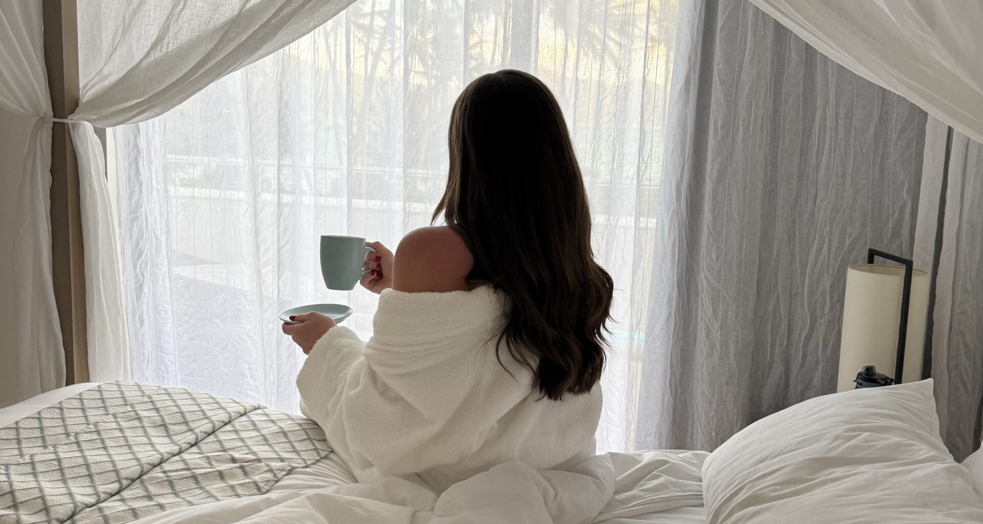 woman sitting in bed