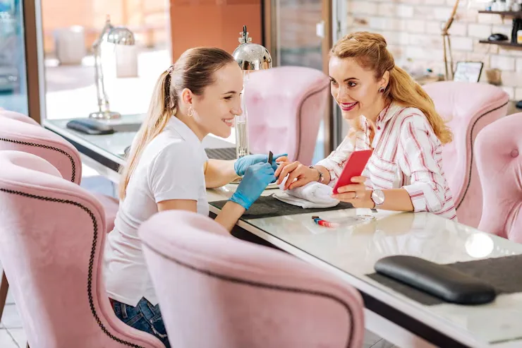 happy women in nail salon